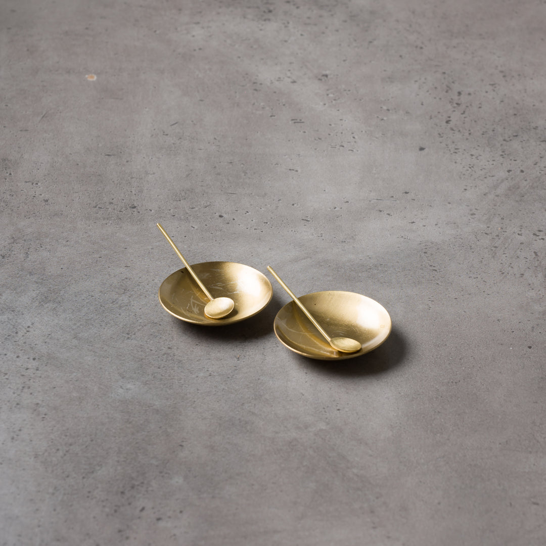Brass personal salt cellars available for rent for weddings and corporate events.